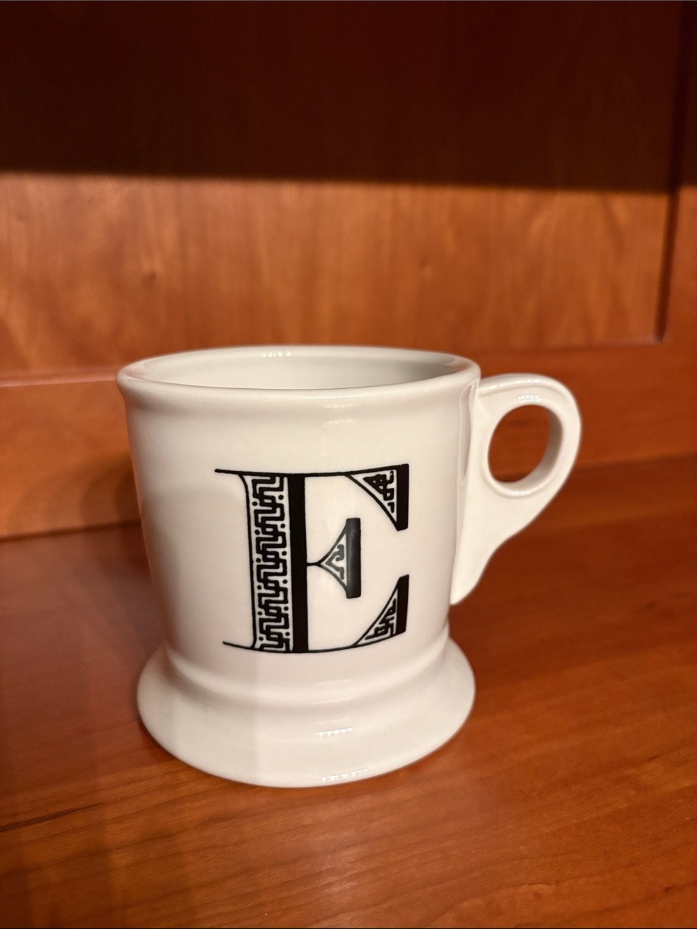 Anthropologie White Ceramic Mug with Decorative Black 'E' Monogram